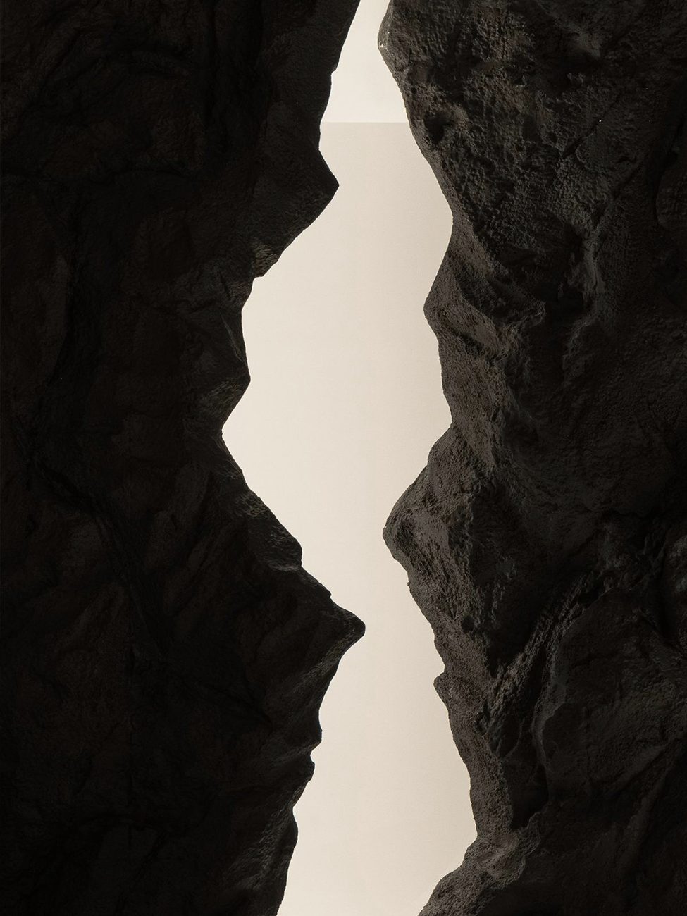 View through a sheltered stone opening to the sky — enclosure as architecture